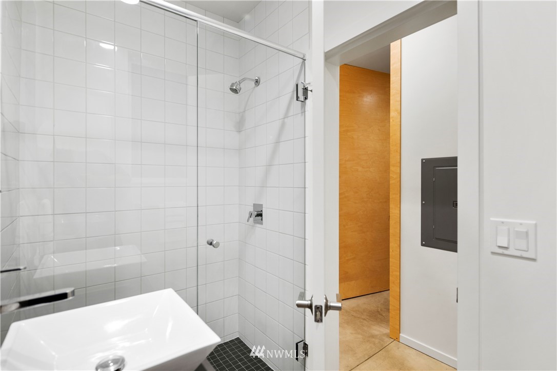 1623 14th Avenue, Unit E Seattle, WA 98122 - Photo 6 of 40 a bathroom with a shower and a sink