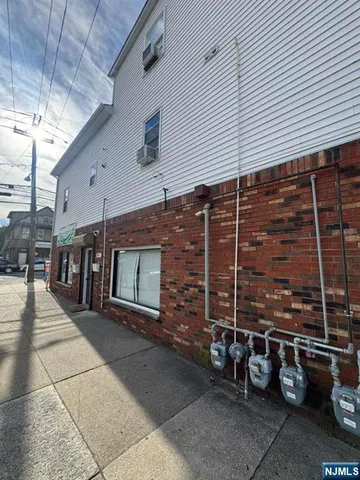 a view of a car garage with parked cars