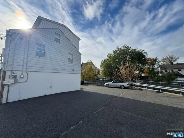 a view of a house with a garage