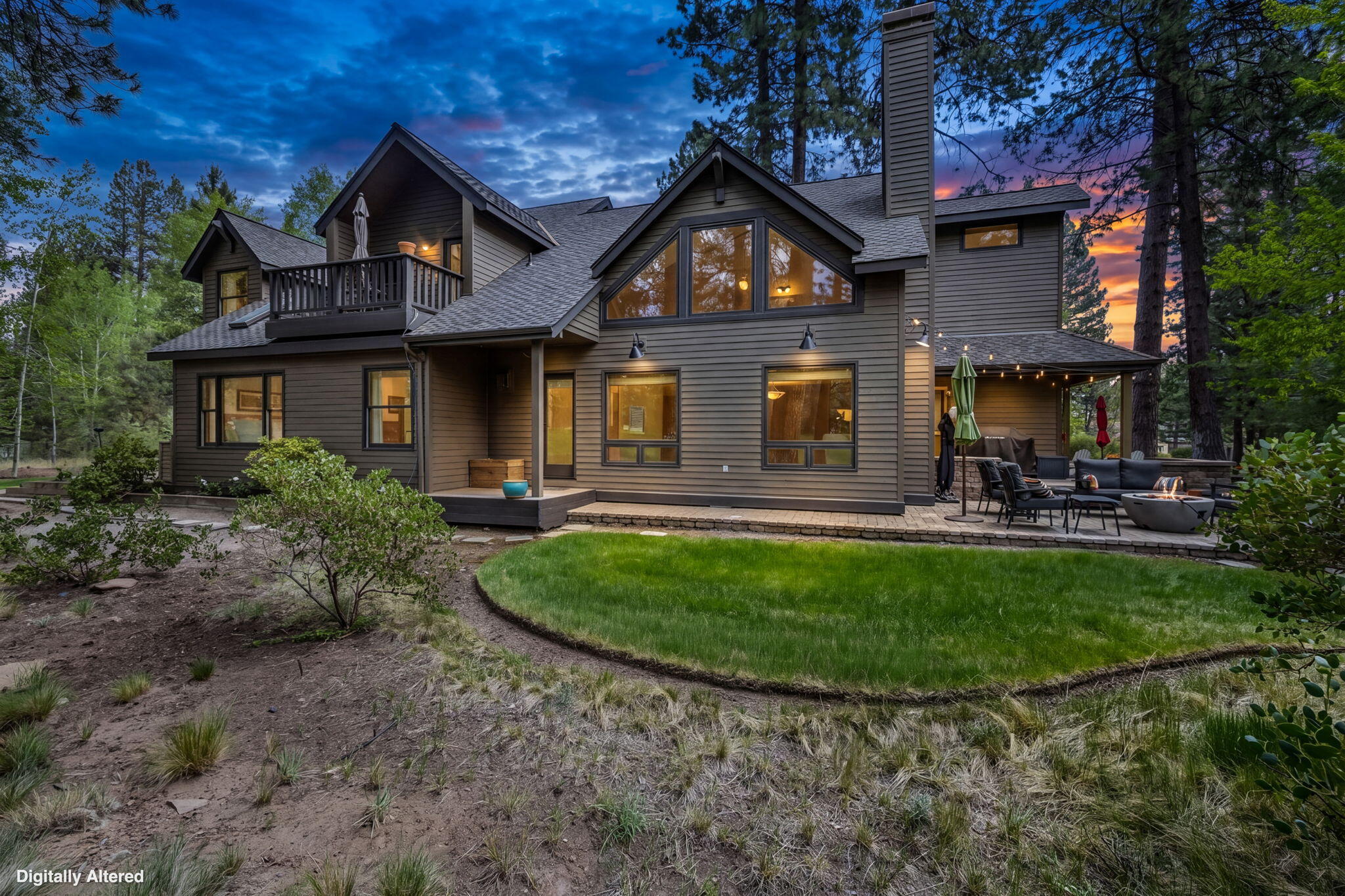 60779 Currant Way Bend, OR 97702 - Photo 2 of 63 a front view of a house with a yard