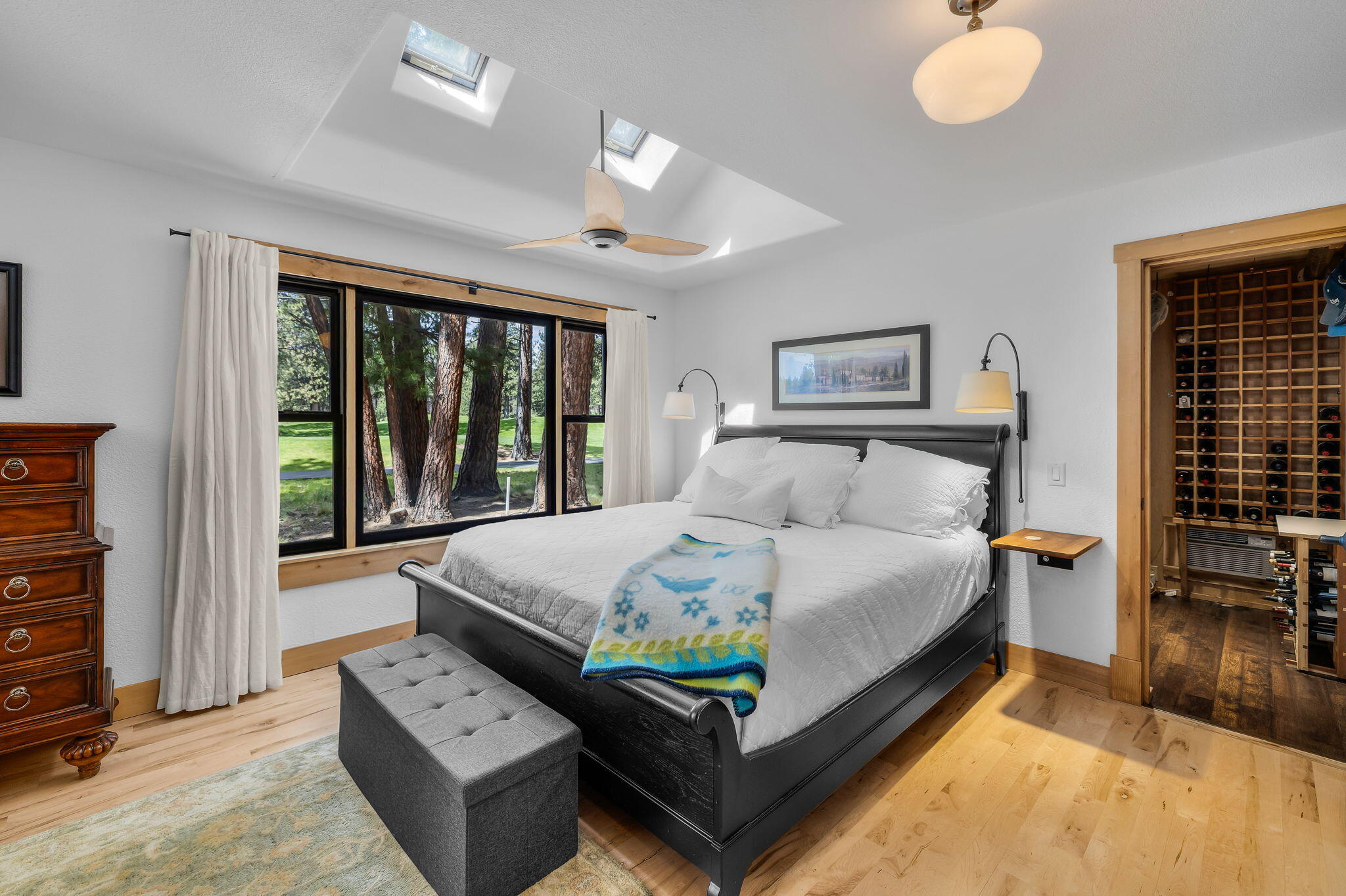 60779 Currant Way Bend, OR 97702 - Photo 22 of 63 a bedroom with bed and a large window