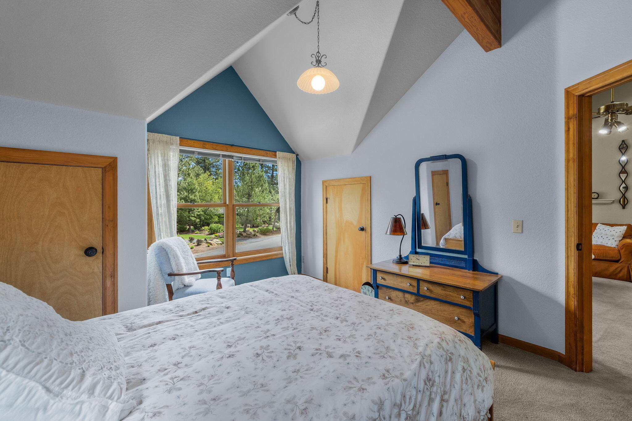 60779 Currant Way Bend, OR 97702 - Photo 46 of 63 a bedroom with a bed and large window