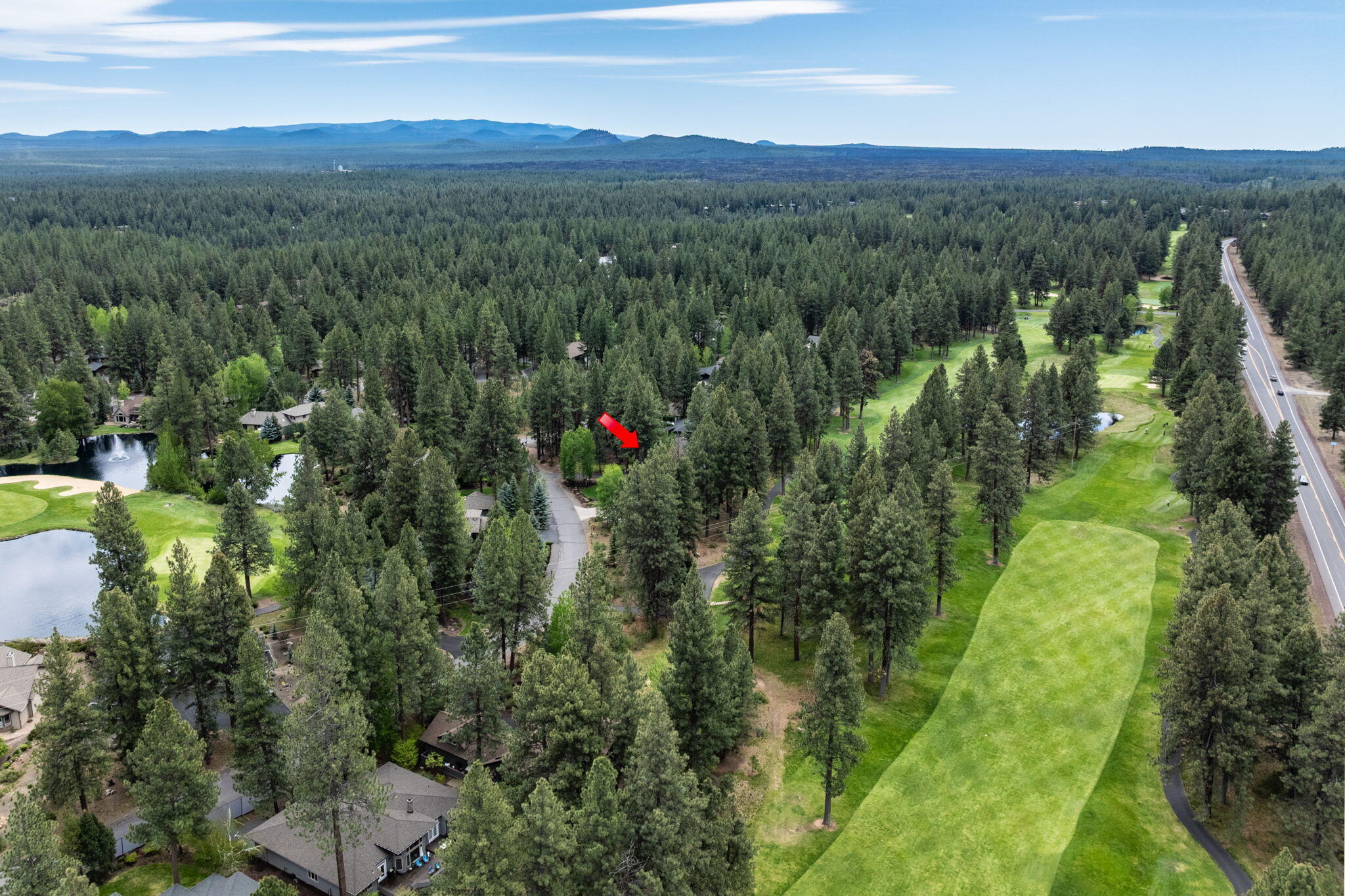 60779 Currant Way Bend, OR 97702 - Photo 53 of 63 a view of a lush green hillside and houses