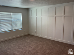 2796 West Aurora Avenue Mapleton, UT 84664 - Photo 5 of 8 Unfurnished bedroom with carpet and a textured ceiling