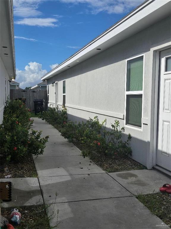 2104 Stauffers Street Weslaco, TX 78596 - Photo 12 of 12 View of property exterior with stucco siding
