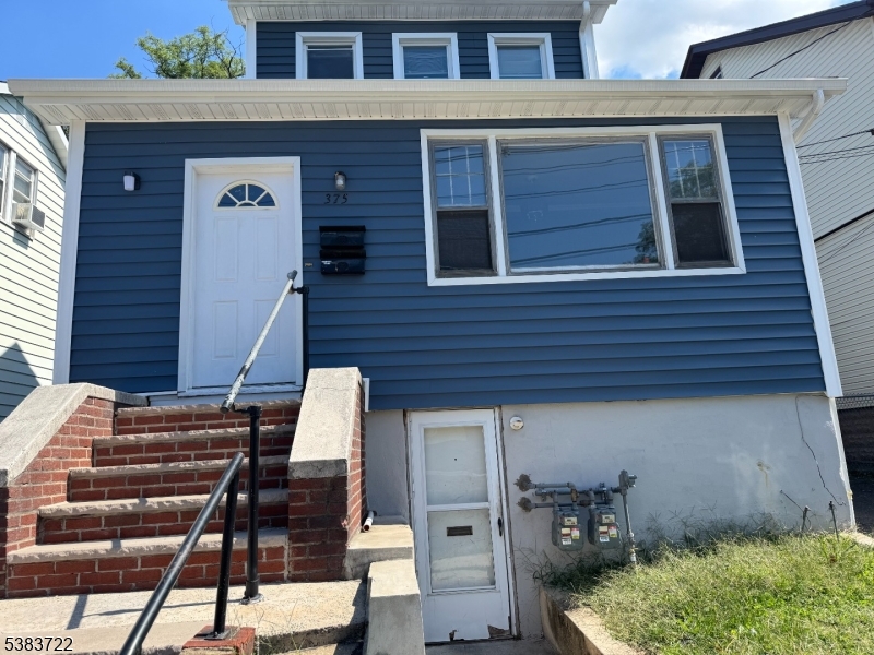 375 Tower Street Union, NJ 07088 - Photo 3 of 11 a front view of a house with stairs