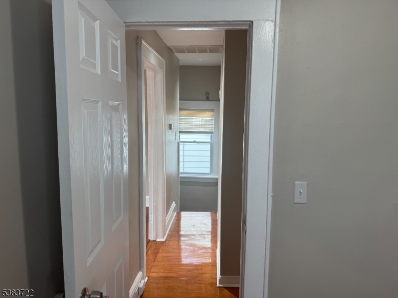 375 Tower Street Union, NJ 07088 - Photo 5 of 11 a view of a bathroom from a hallway