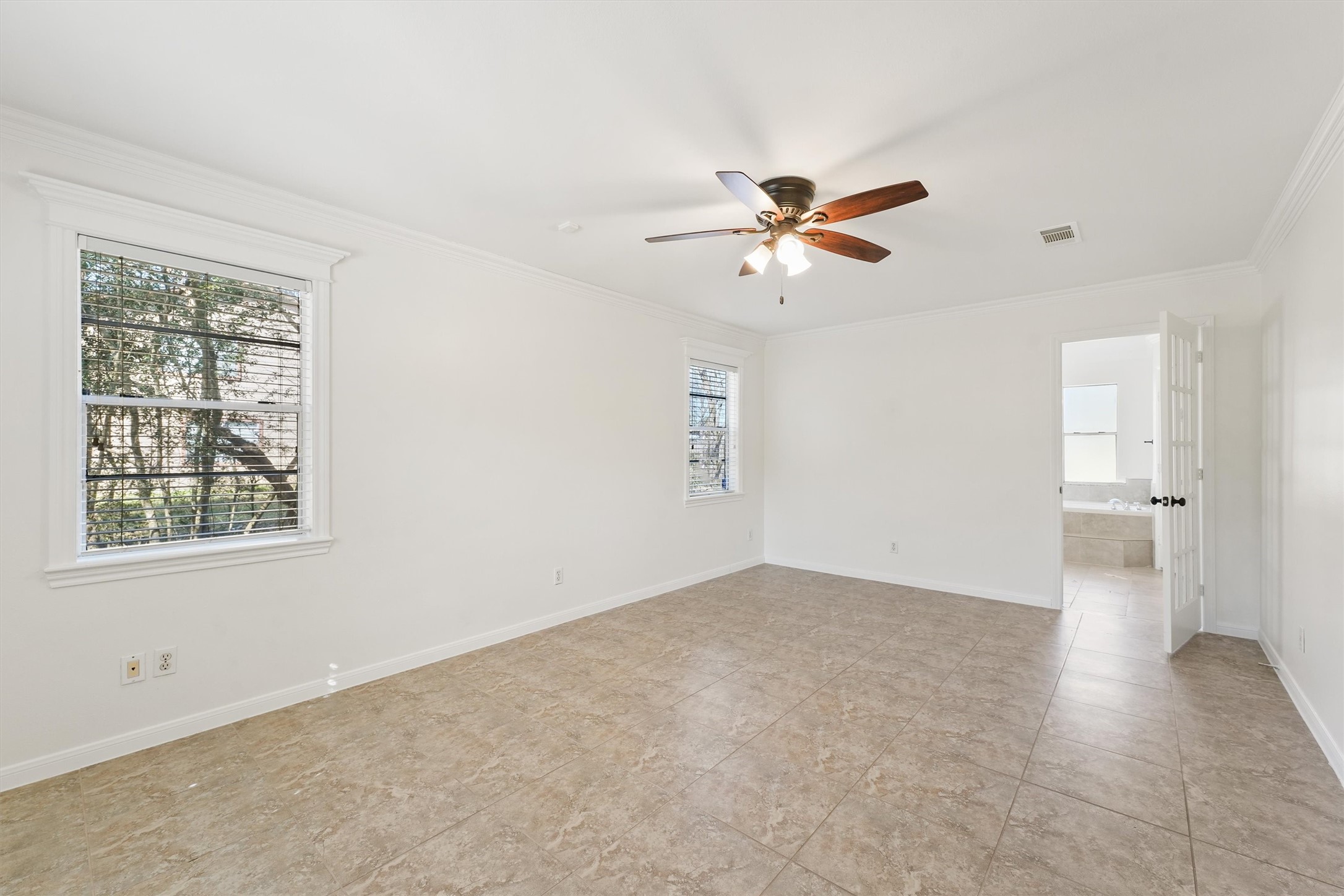 22514 Lakeway Drive Spring, TX 77373 - Photo 13 of 18 wooden floor in an empty room with a window