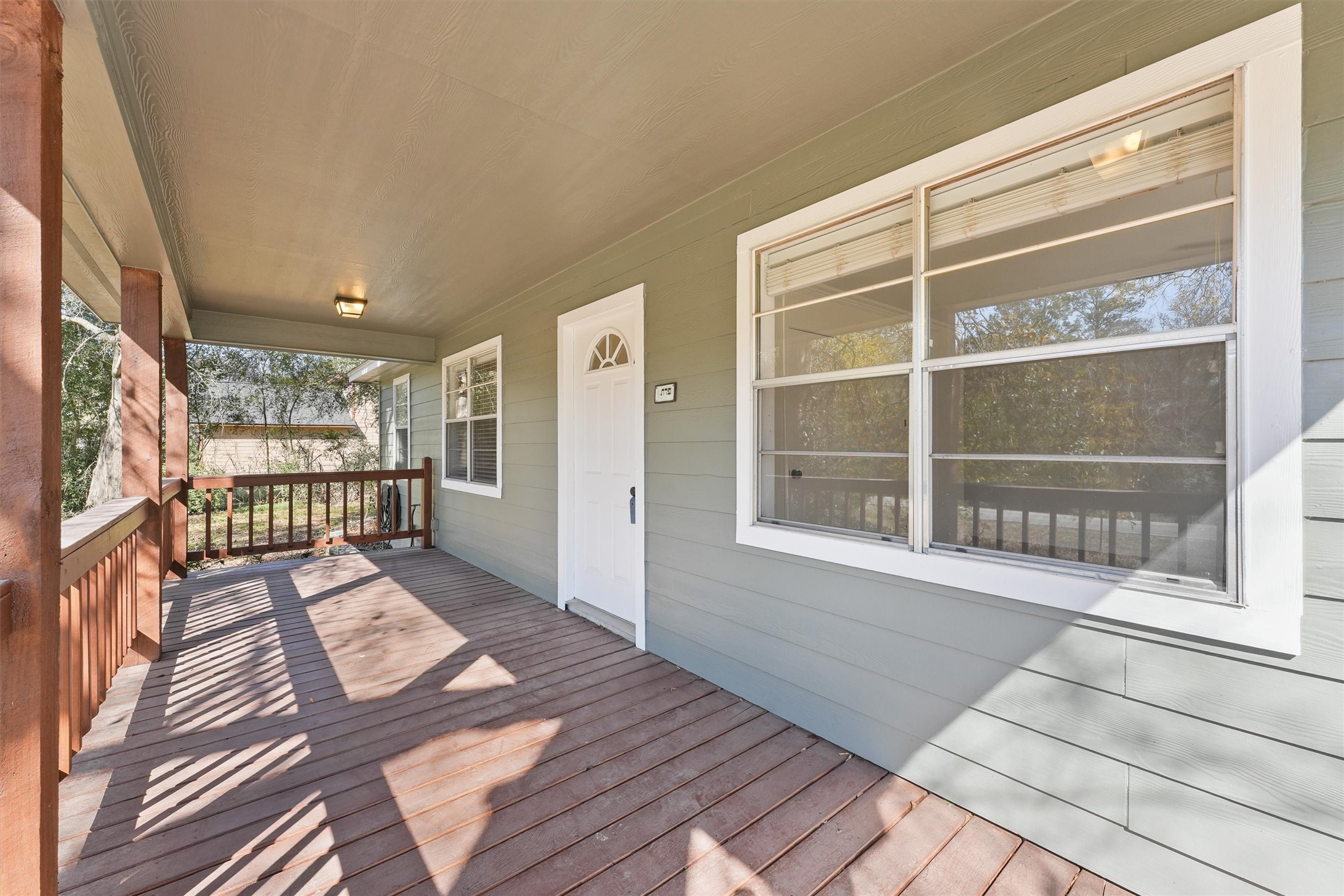 22514 Lakeway Drive Spring, TX 77373 - Photo 4 of 18 a view of an empty room with wooden floor and a window