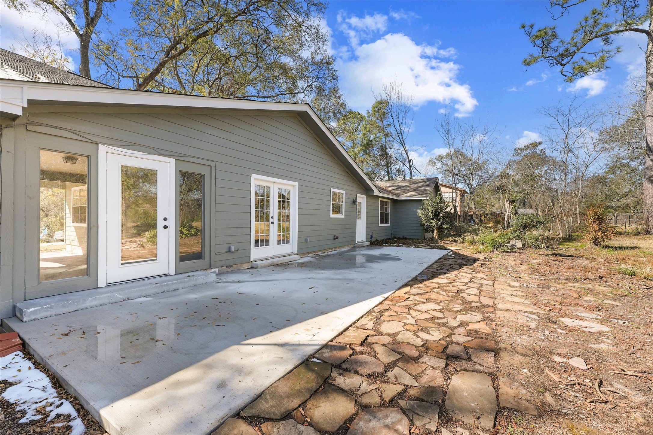22514 Lakeway Drive Spring, TX 77373 - Photo 5 of 18 a view of a house with a snow in the yard
