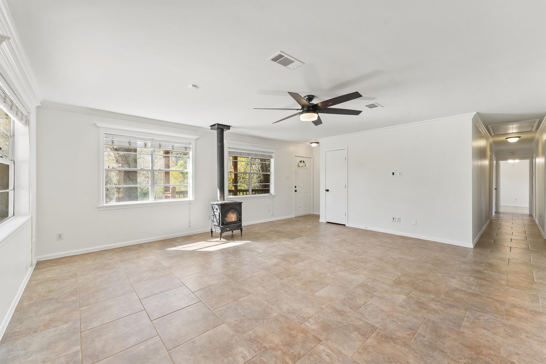22514 Lakeway Drive Spring, TX 77373 - Photo 8 of 18 wooden floor in an empty room with a window