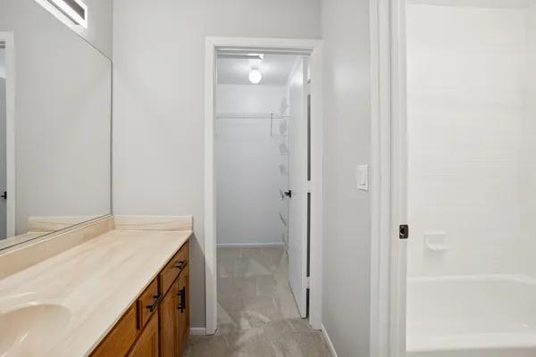 a view of a room with racks on the wall