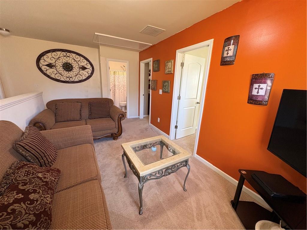 1728 Mary Avenue Griffin, GA 30224 - Photo 16 of 31 a living room with furniture and a window