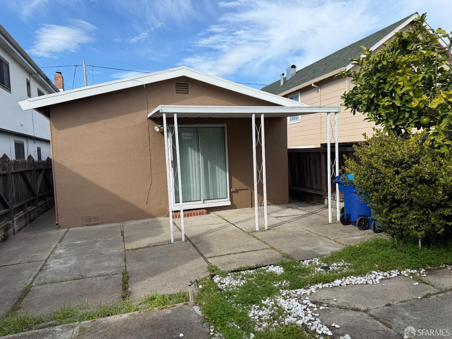 45 Spruce Street Millbrae, CA 94030 - Photo 14 of 17 a view of a house with a yard