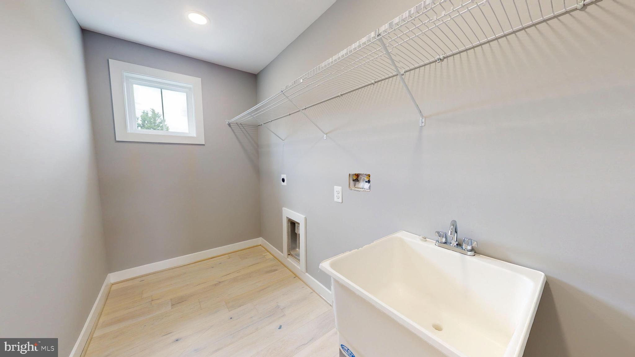6516 Golden Ring Road Rosedale, MD 21237 - Photo 23 of 32 a bathroom with a sink and vanity