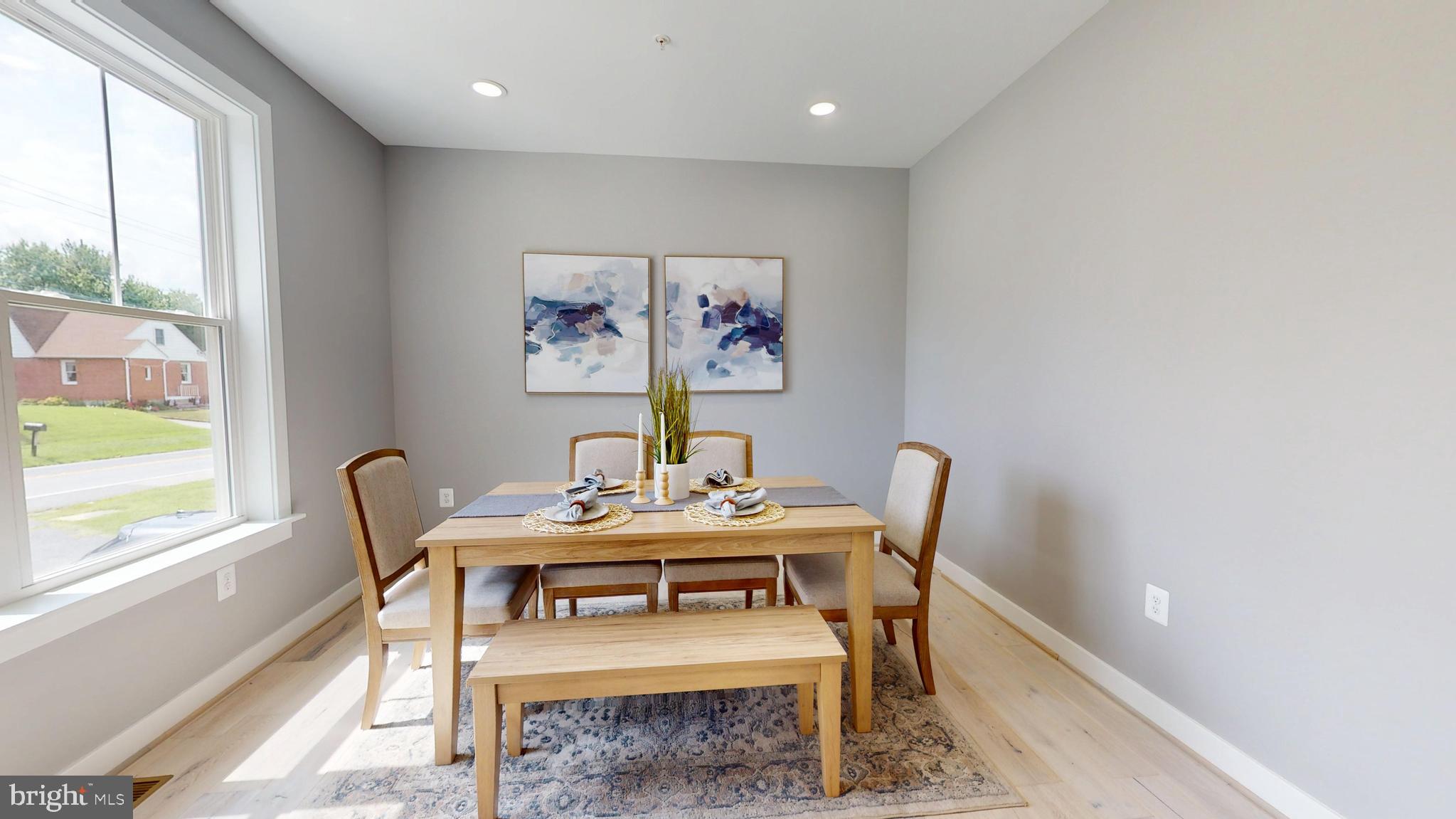 6516 Golden Ring Road Rosedale, MD 21237 - Photo 3 of 32 a view of a dining room with furniture and window