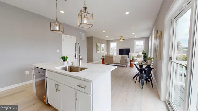 a view of a kitchen and living room