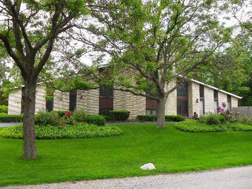 2134 Northgate Road Northfield, IL 60093 - Photo 1 of 1 a front view of a house with garden