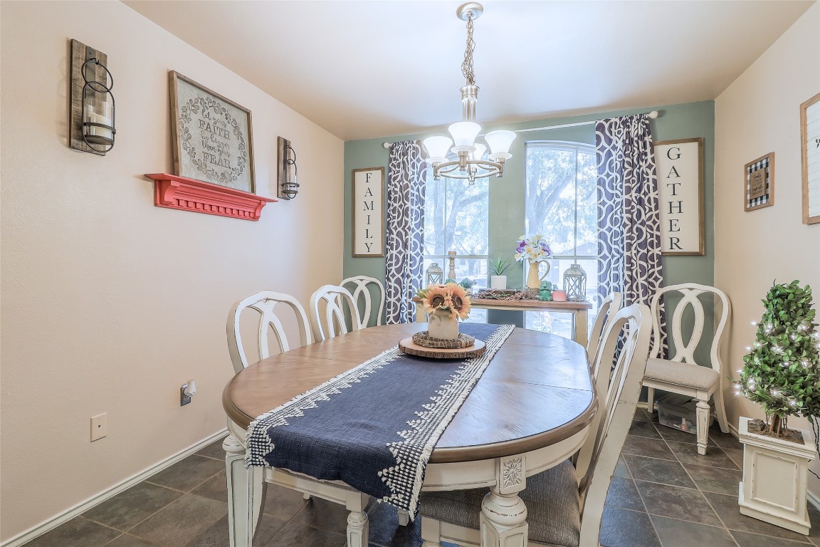 1705 Friars Tale Lane Austin, TX 78748 - Photo 11 of 29 a view of a dining room with furniture window and outside view