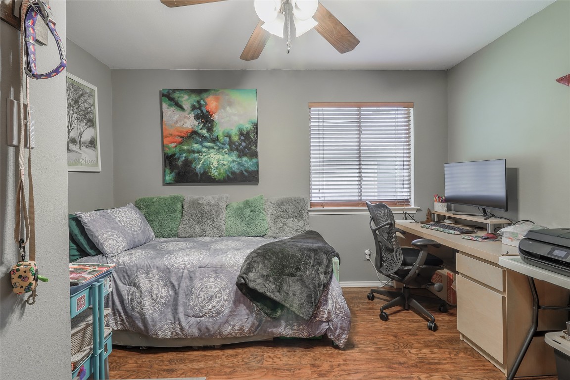 1705 Friars Tale Lane Austin, TX 78748 - Photo 16 of 29 a living room with furniture floor to ceiling window and a flat screen tv