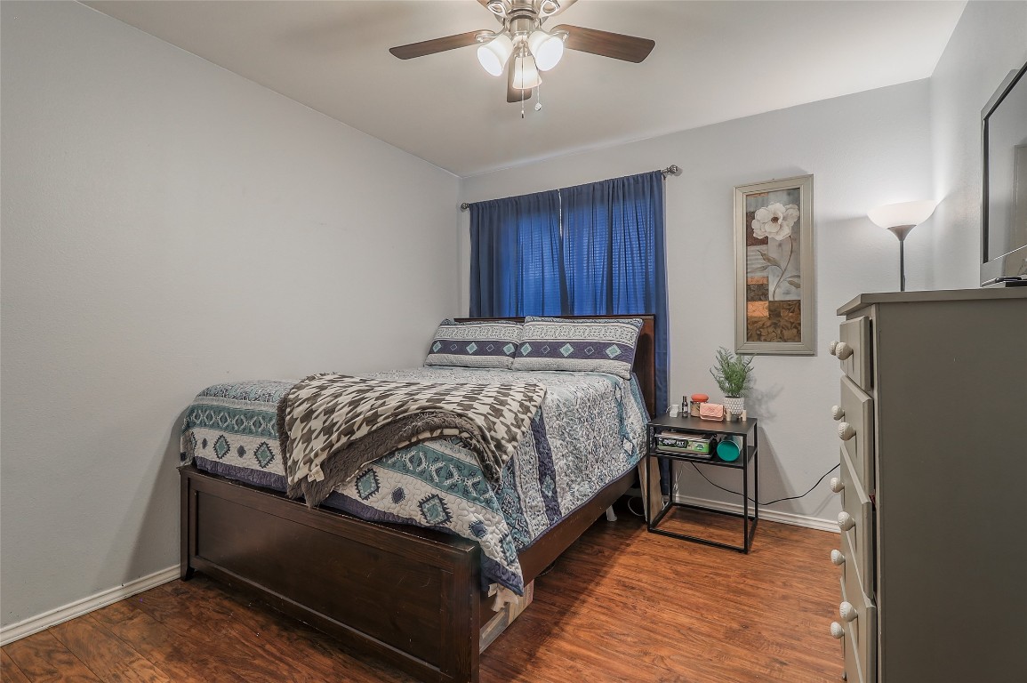 1705 Friars Tale Lane Austin, TX 78748 - Photo 18 of 29 a bed sitting in a bedroom and dressers next to a window