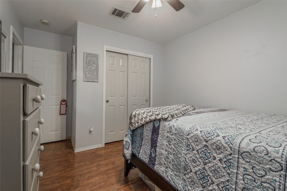 1705 Friars Tale Lane Austin, TX 78748 - Photo 19 of 29 a bedroom with a bed and a dresser