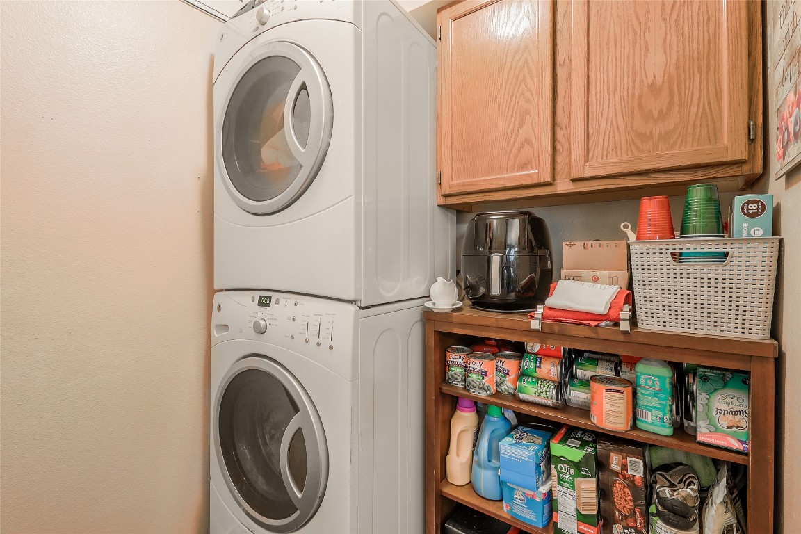 1705 Friars Tale Lane Austin, TX 78748 - Photo 23 of 29 a utility room with dryer and washer