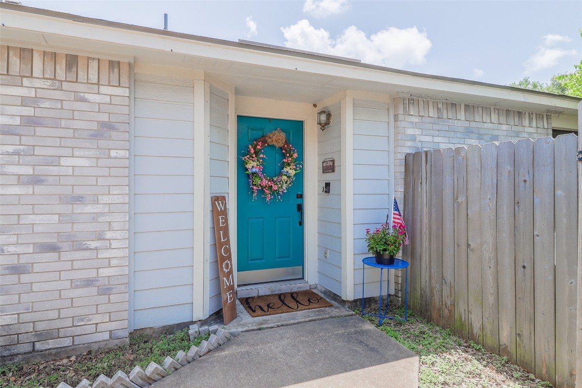 1705 Friars Tale Lane Austin, TX 78748 - Photo 3 of 29 a view of entryway with a flower plants
