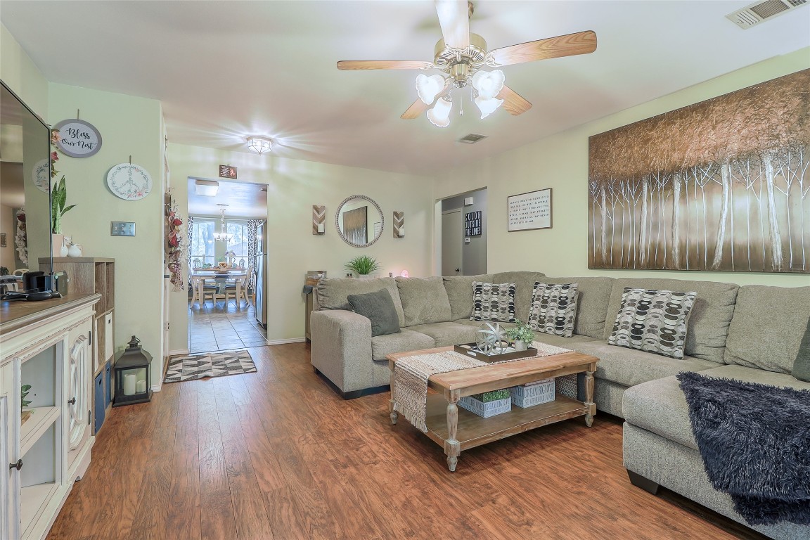 1705 Friars Tale Lane Austin, TX 78748 - Photo 4 of 29 a living room with furniture and a wooden floor