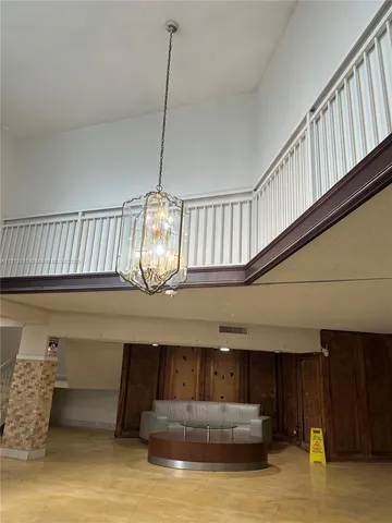 a room with fireplace and furniture