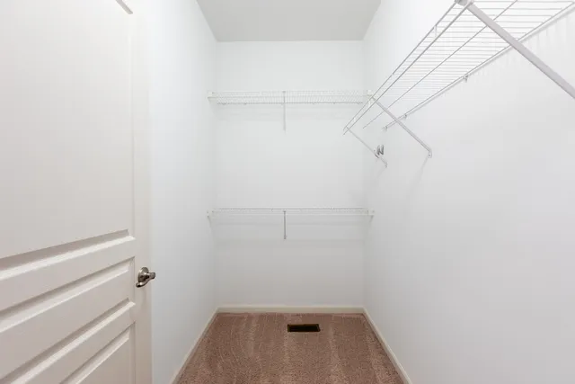 a view of a room with racks on the wall