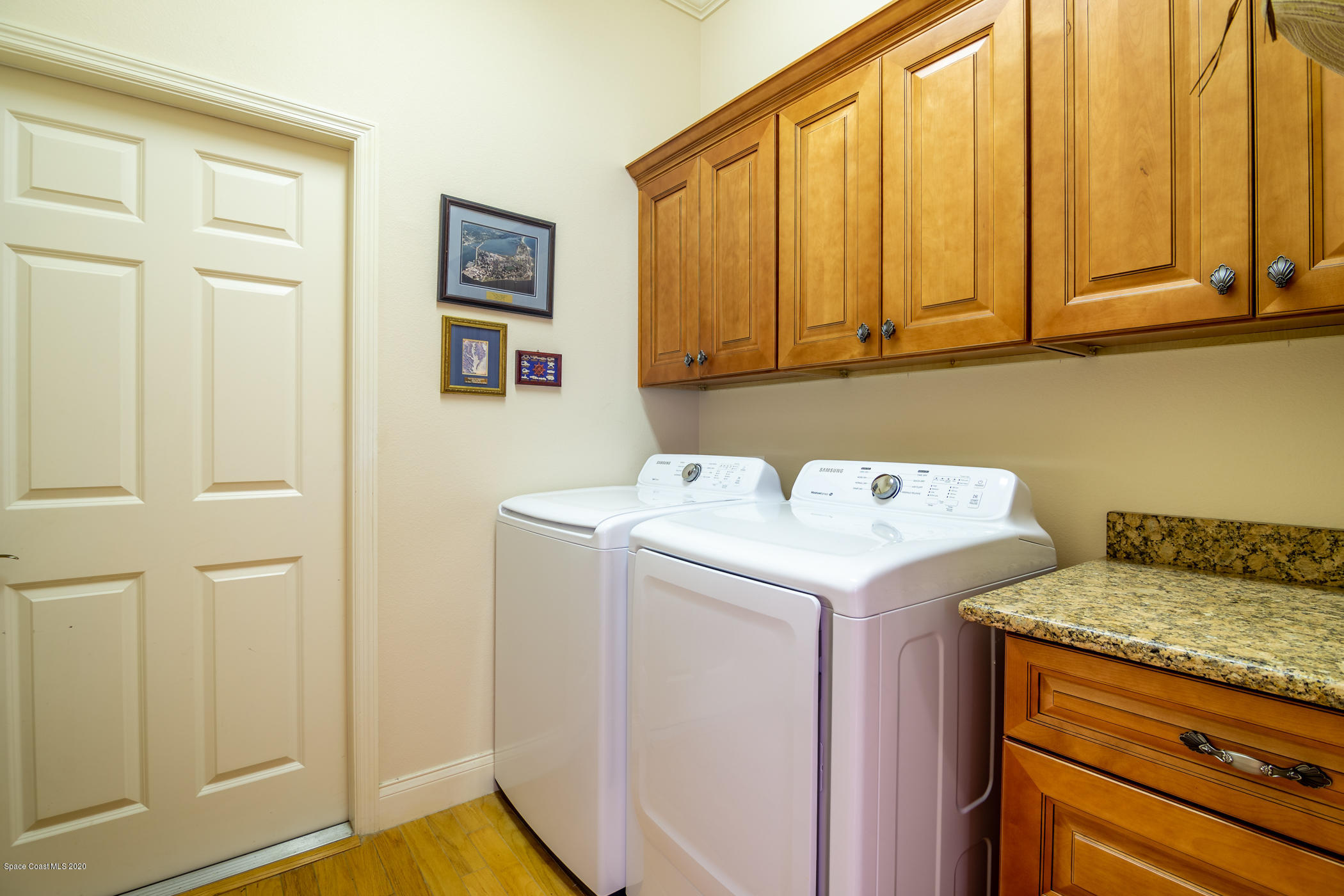 4070 Alamanda Key Drive Melbourne, FL 32901 - Photo 13 of 32 a utility room with dryer and washer