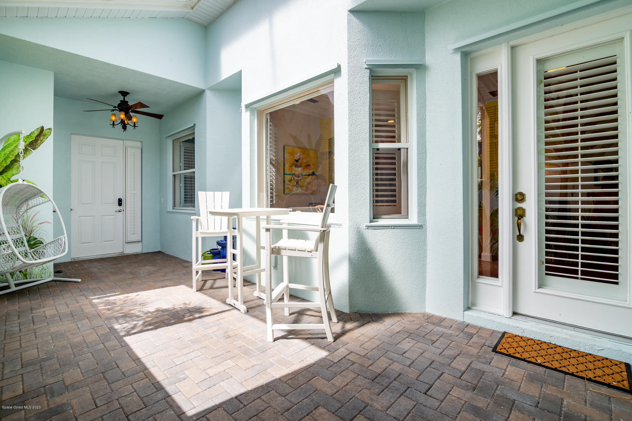 4070 Alamanda Key Drive Melbourne, FL 32901 - Photo 21 of 32 a view of a dinning room with a table and chairs