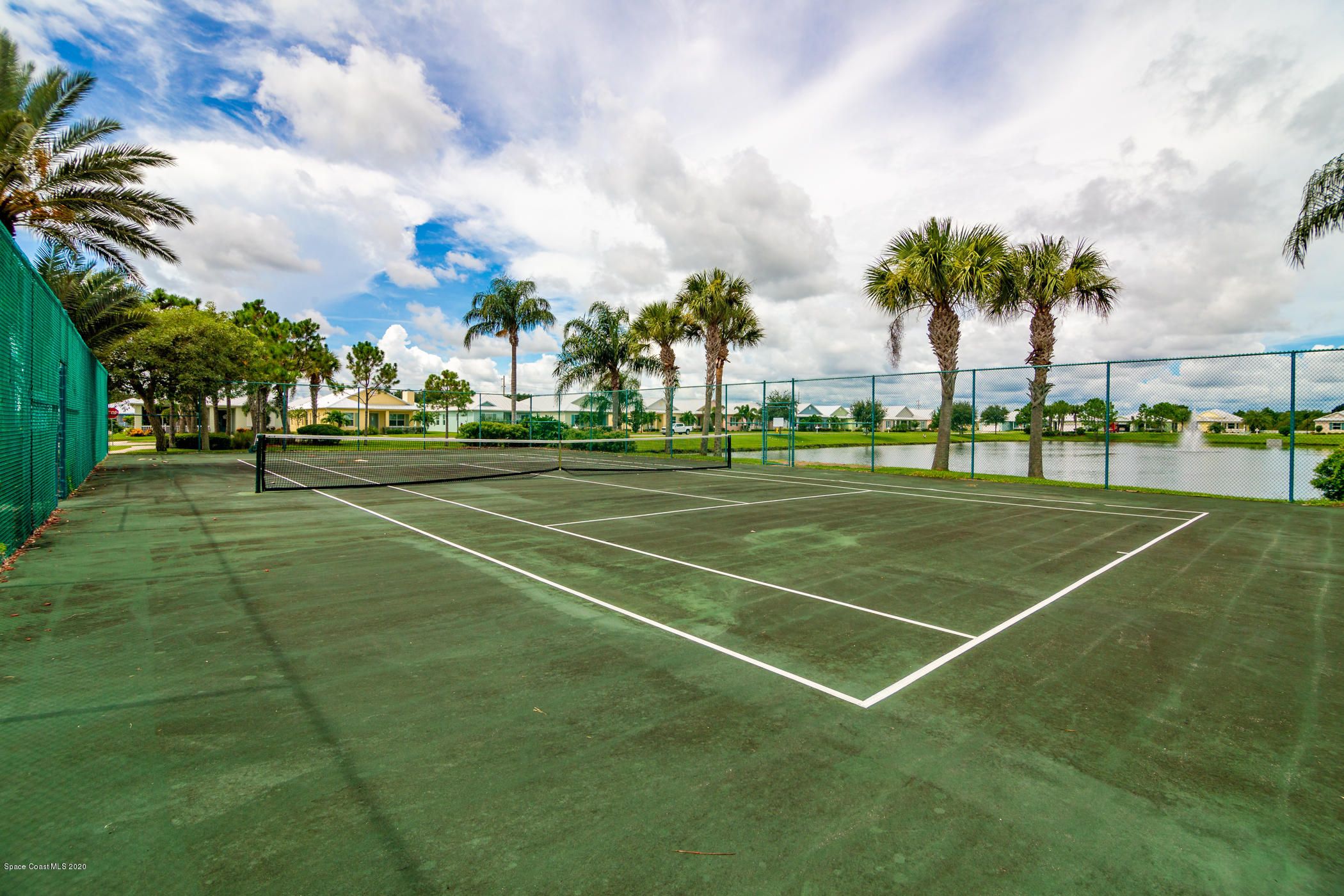 4070 Alamanda Key Drive Melbourne, FL 32901 - Photo 23 of 32 a view of tennis court and outdoor space