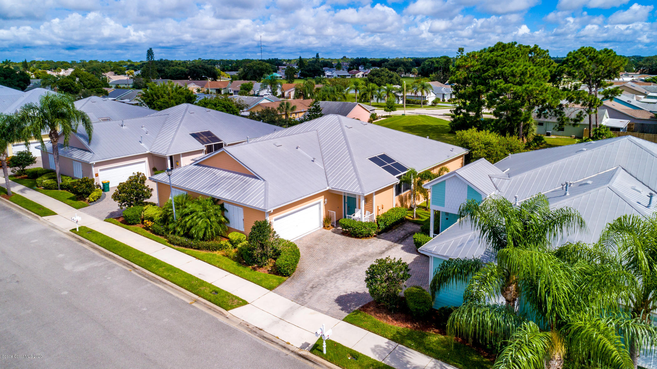 4070 Alamanda Key Drive Melbourne, FL 32901 - Photo 30 of 32 an aerial view of residential houses with outdoor space and street view
