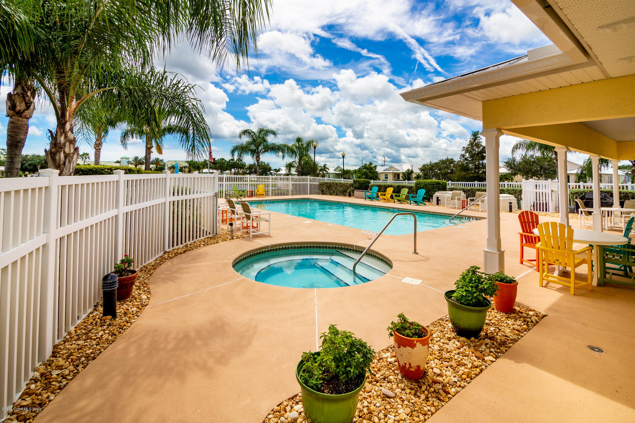 4070 Alamanda Key Drive Melbourne, FL 32901 - Photo 3 of 32 a view of a swimming pool with a patio