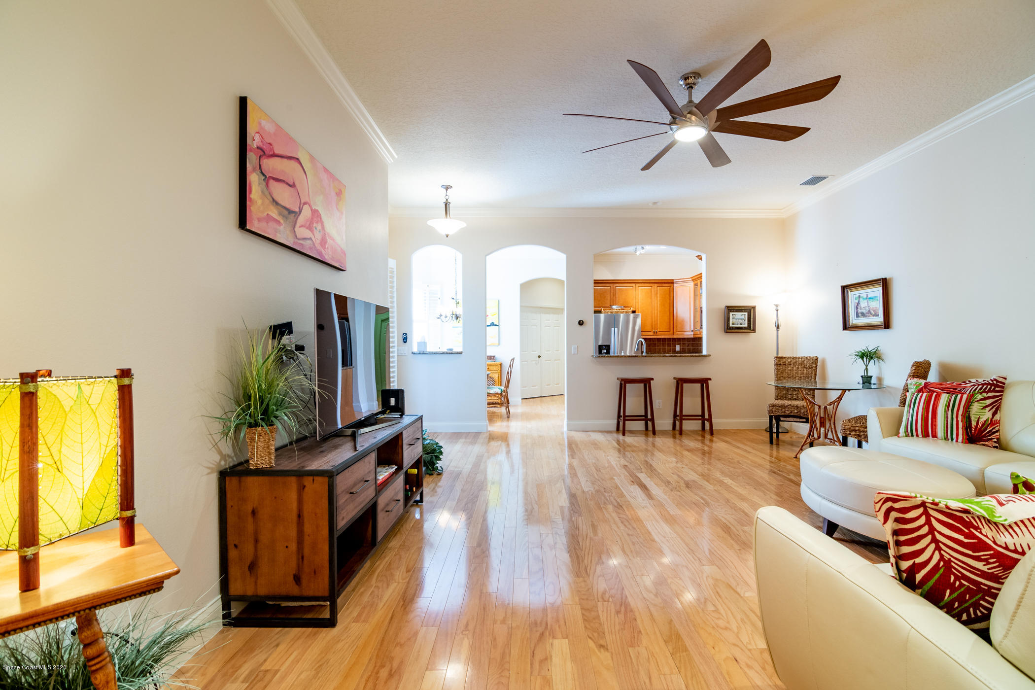 4070 Alamanda Key Drive Melbourne, FL 32901 - Photo 4 of 32 a living room with furniture and a flat screen tv