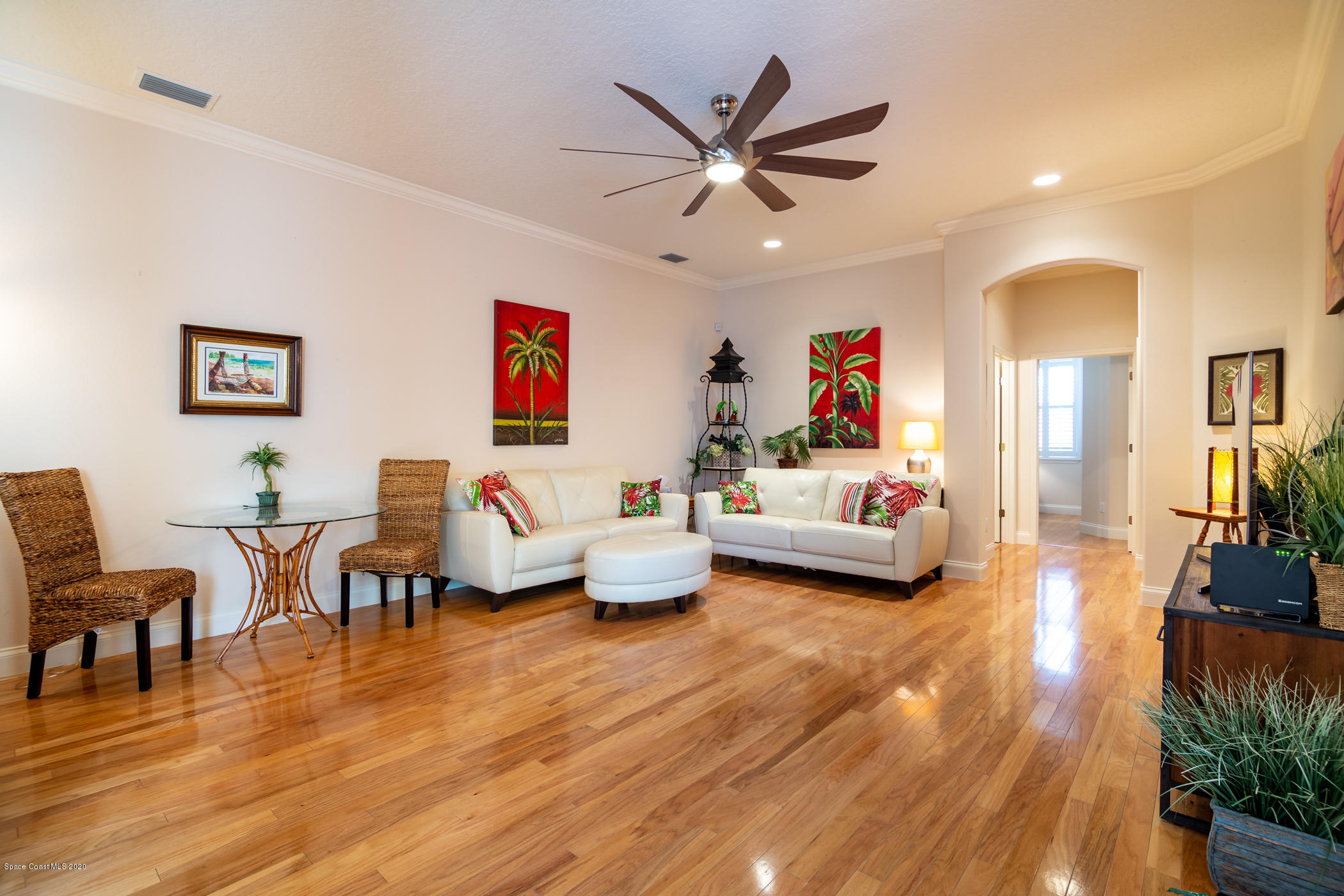 4070 Alamanda Key Drive Melbourne, FL 32901 - Photo 6 of 32 a living room with furniture and a wooden floor