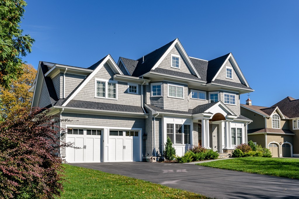 44 Peregrine Road Newton, MA 02459 - Photo 1 of 25 a front view of a house with a yard