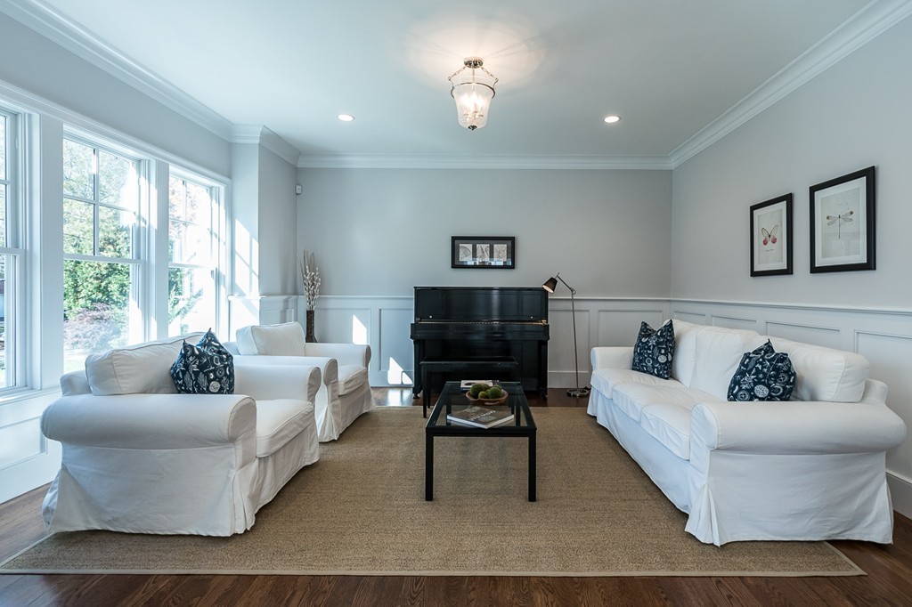 44 Peregrine Road Newton, MA 02459 - Photo 5 of 25 a living room with furniture and a flat screen tv