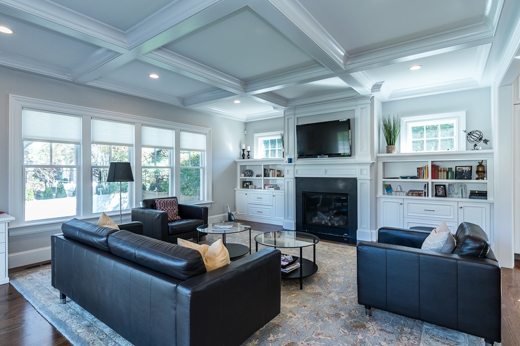 44 Peregrine Road Newton, MA 02459 - Photo 8 of 25 a living room with furniture large window and a fireplace