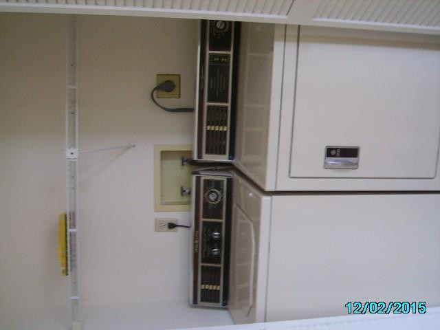 7819 Lakeside Boulevard, Unit 882 Boca Raton, FL 33434 - Photo 14 of 17 Closet w/ Washer & Dryer