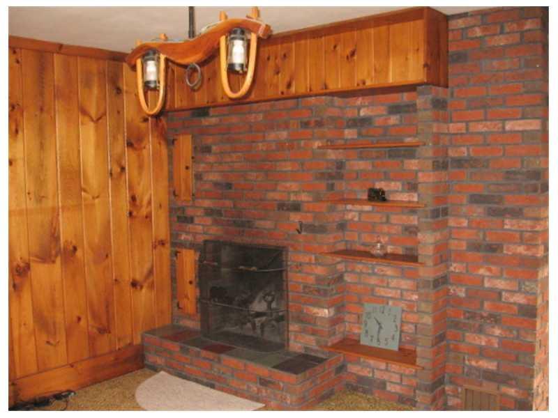 48 Gibson Road Clinton, ME 04927 - Photo 6 of 26 Living Room. Side 2 of the fireplace...