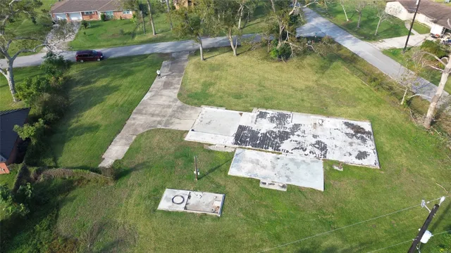 a view of swimming pool with a yard