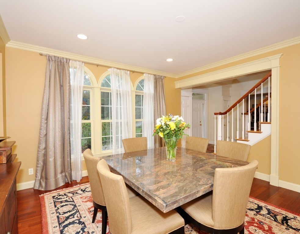 65 Summit Street Concord, MA 01742 - Photo 15 of 29 a dining room with furniture and wooden floor
