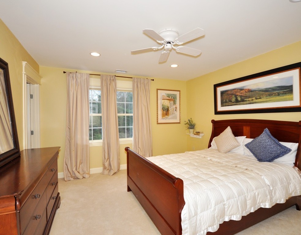 65 Summit Street Concord, MA 01742 - Photo 18 of 29 a bedroom with a large bed and a window