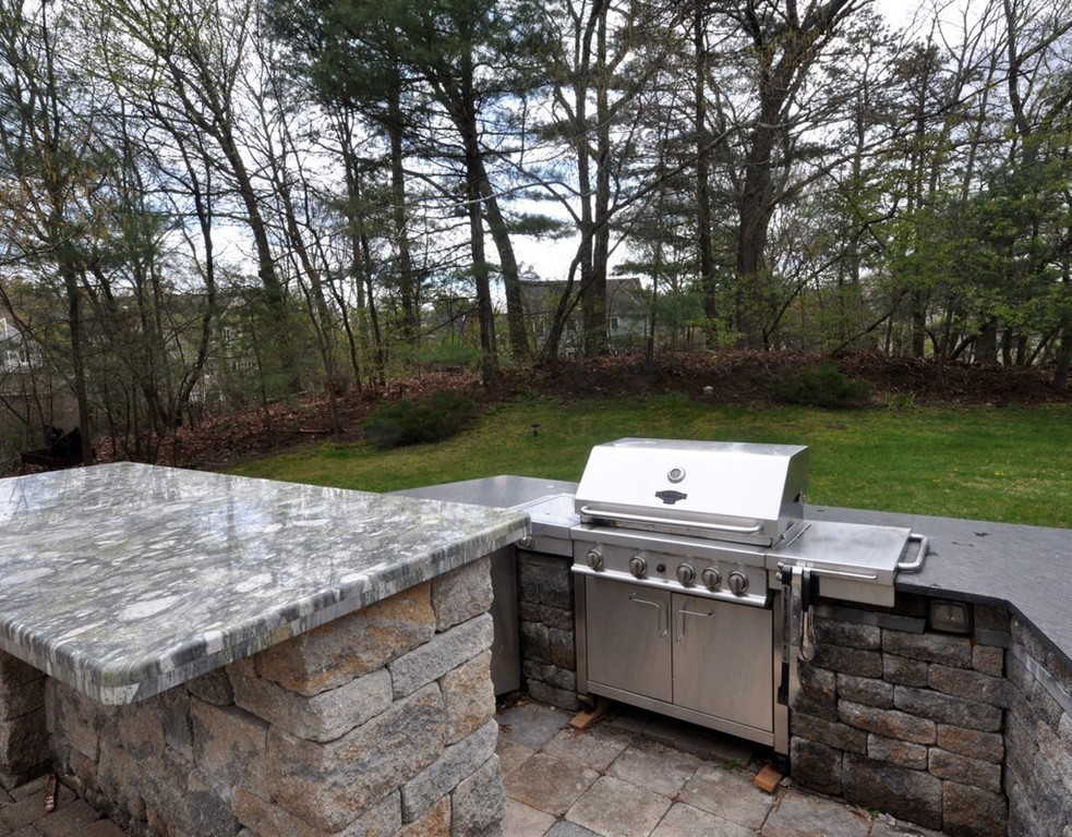 65 Summit Street Concord, MA 01742 - Photo 28 of 29 a view of a backyard with seating area