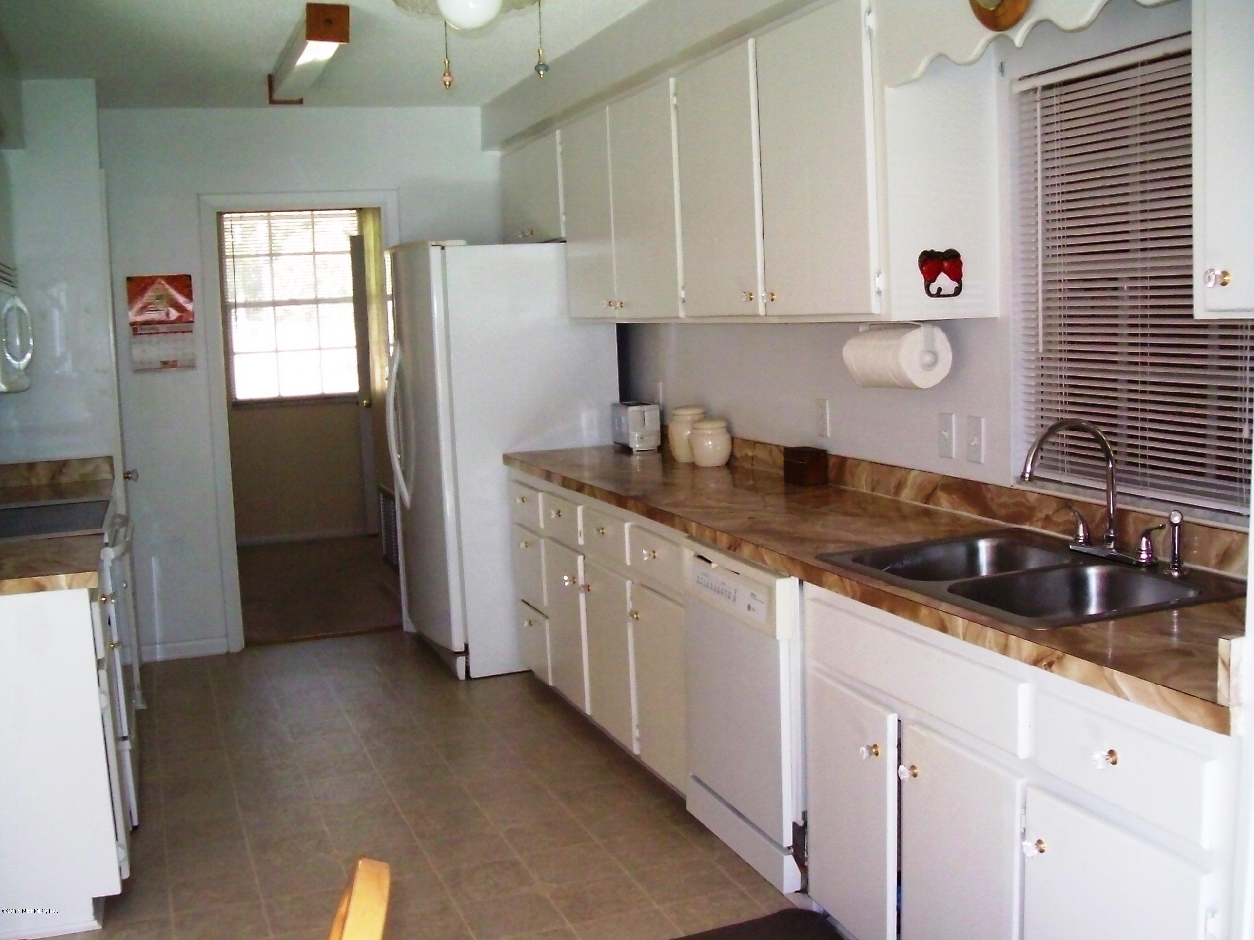 1077 Southeast 46th Loop Keystone Heights, FL 32656 - Photo 13 of 46 13) Large Galley Kitchen