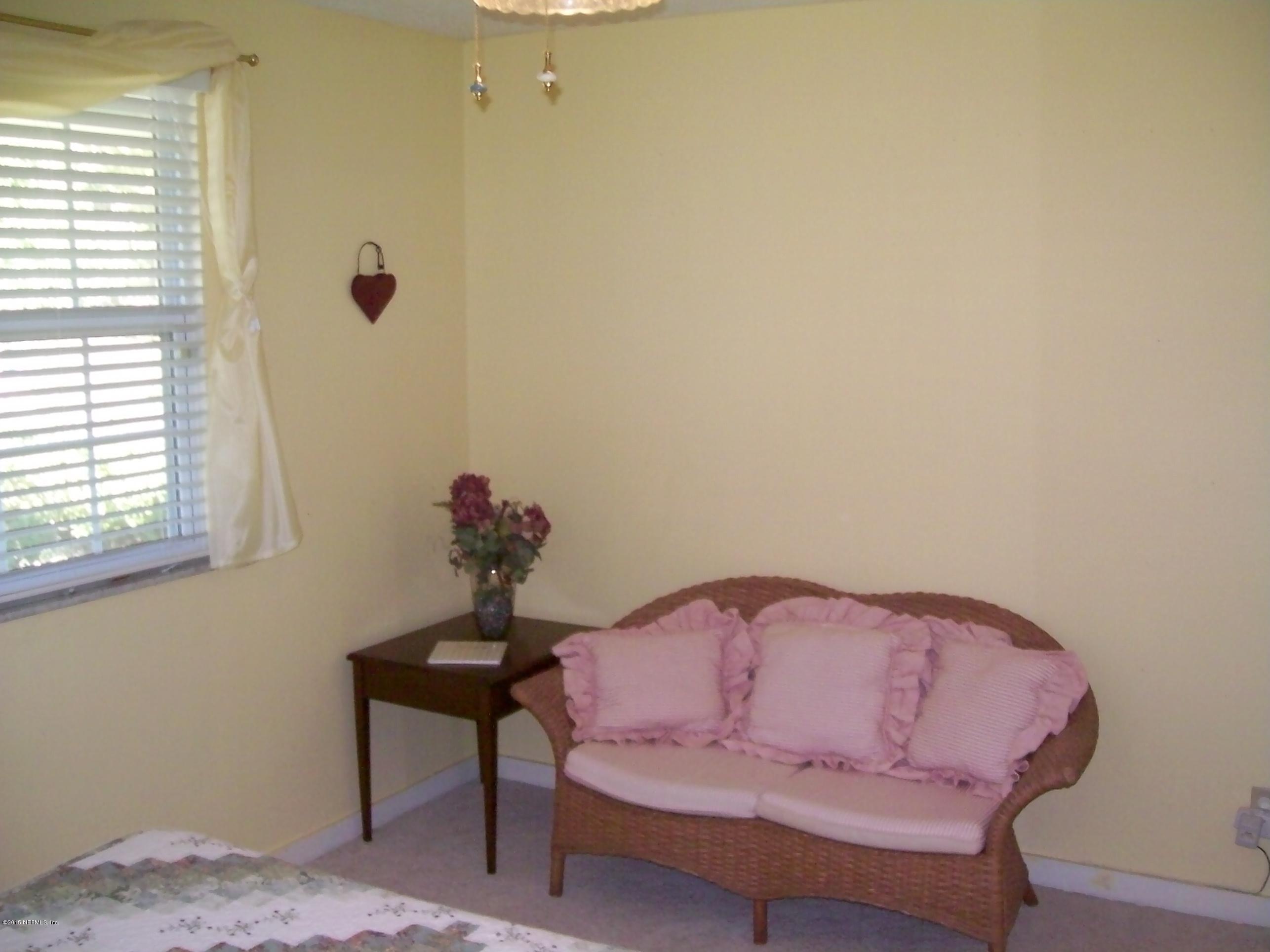 1077 Southeast 46th Loop Keystone Heights, FL 32656 - Photo 19 of 46 19) First Downstairs Bedroom