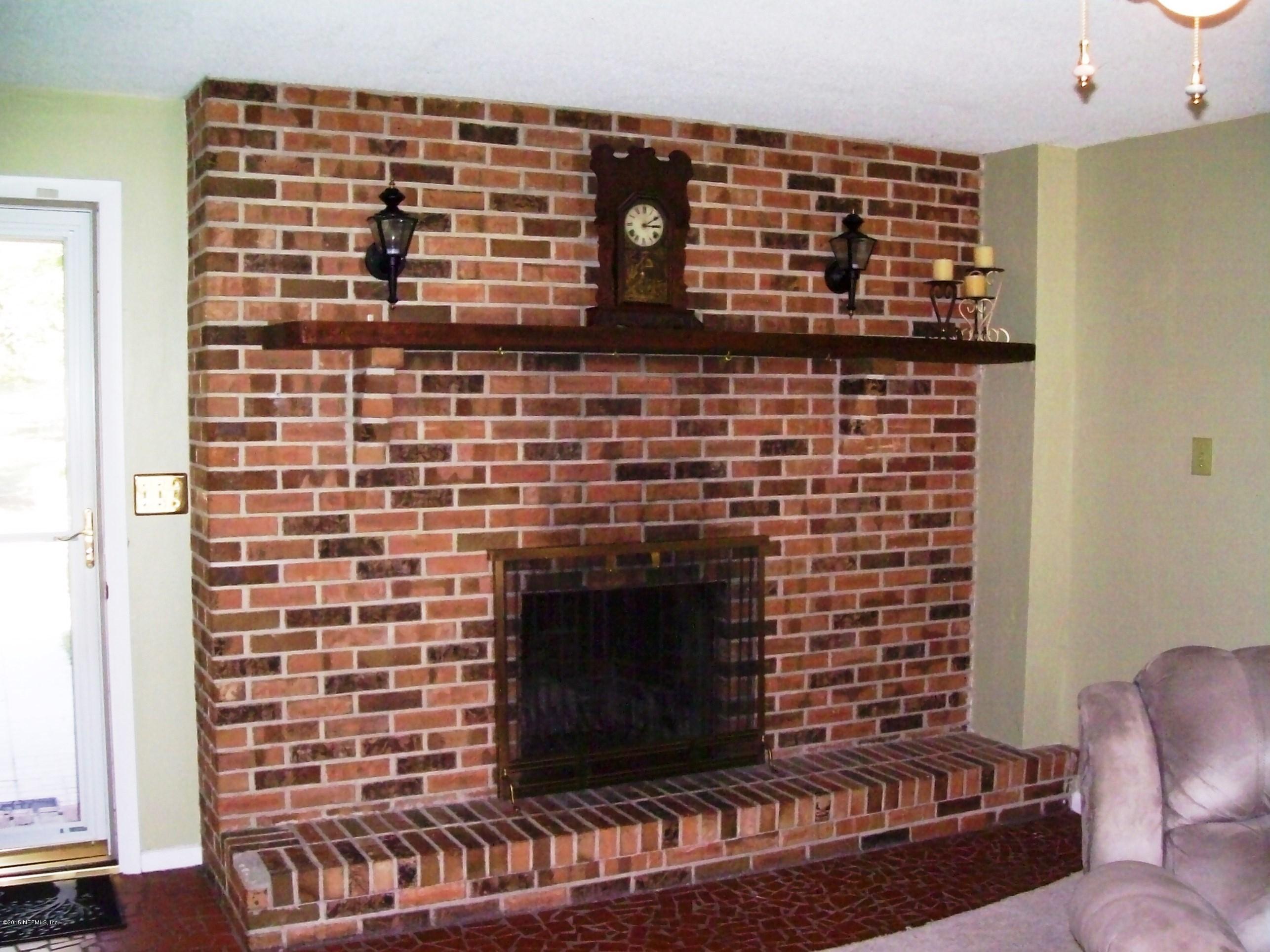 1077 Southeast 46th Loop Keystone Heights, FL 32656 - Photo 9 of 46 9) Living Room Fireplace